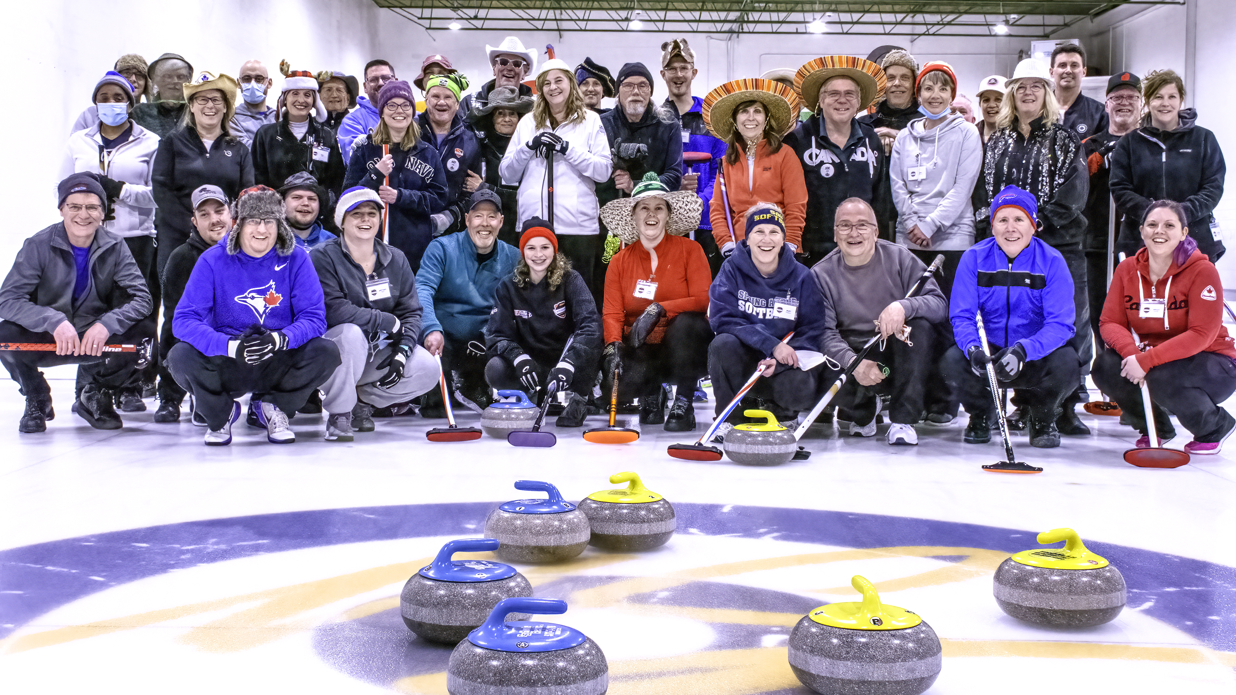 Smiling faces of Learn 2 Curl and Wednesday Co-Ed League curlers